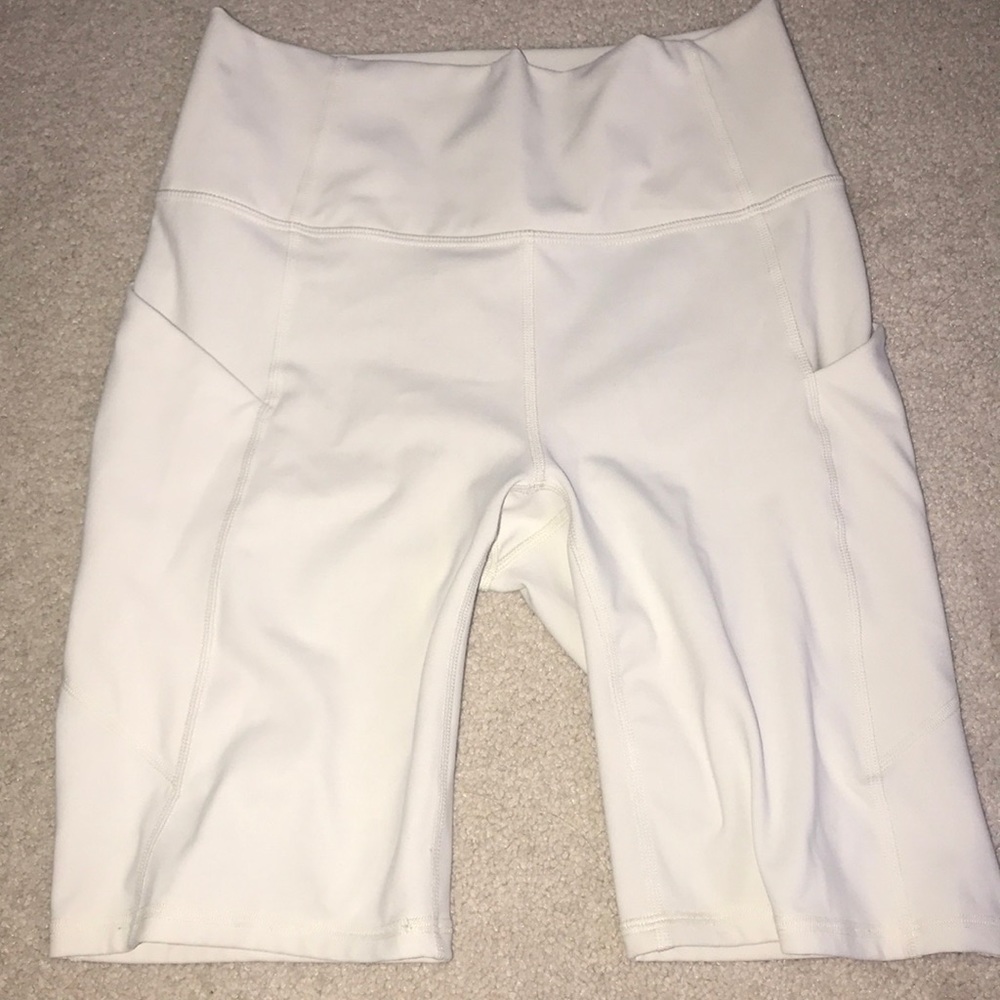 White fabletics biker shorts